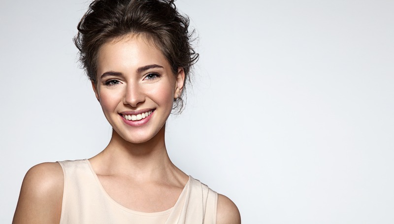 Smiling woman in the original Progen About-page illustration