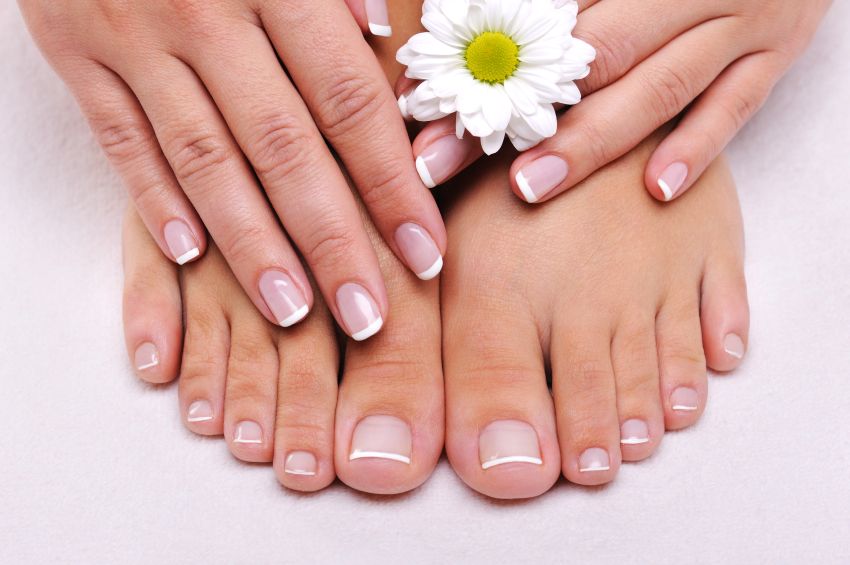 Illustrative photograph of manicured hands and feet